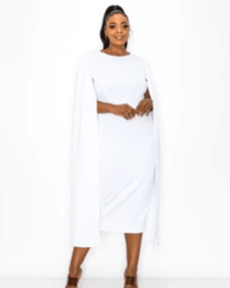 Front of a model wearing a size 1X Naomi Cape Dress in White by L I V D. | dia_product_style_image_id:241369